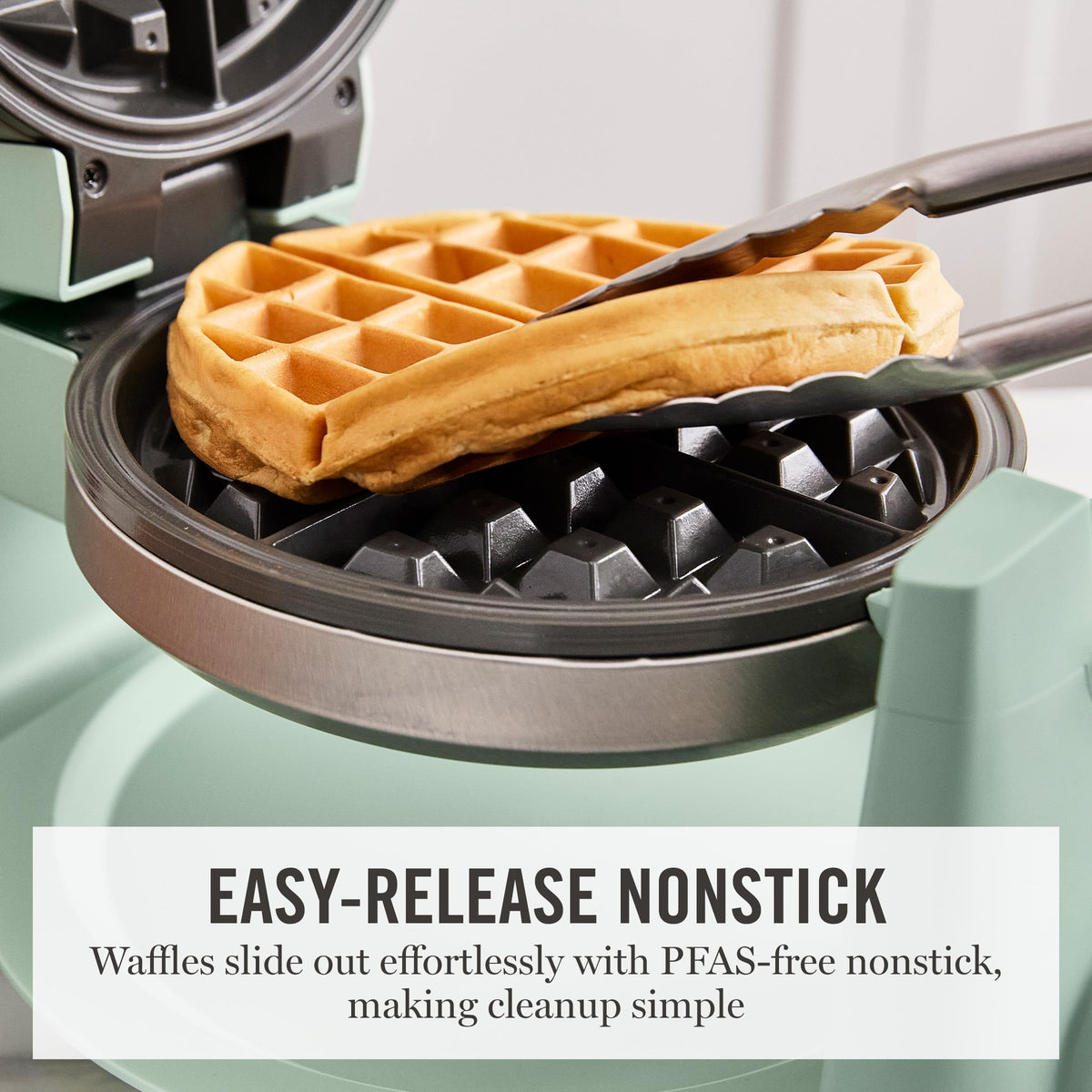 Martha Stewart waffle maker folding handle for compact storage on countertops.