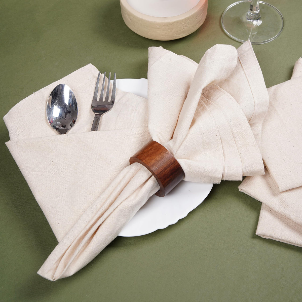 Marubhumi napkins cream hemstitched corner detail enhances table charm.