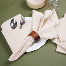 Marubhumi napkins cream hemstitched corner detail enhances table charm.
