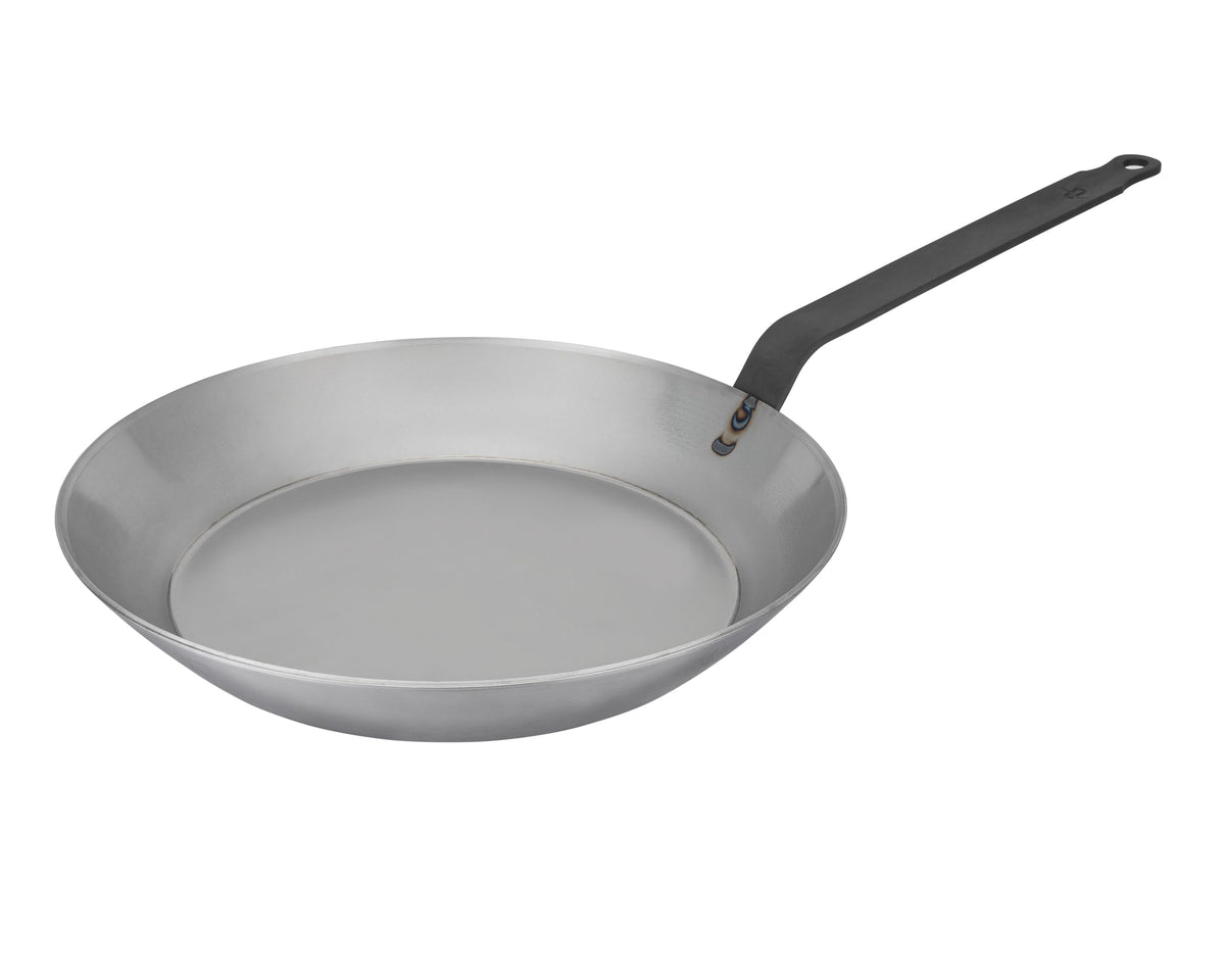 Matfer Bourgeat carbon steel frying pan searing meat with even heat and fast browning