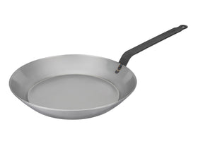 Matfer Bourgeat black carbon steel pan top view highlights even heating for searing