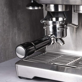 MATOW 54mm funnel auto-activate grinding with front tap for precise dosing.