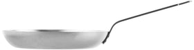 Mauviel M'Steel black carbon pan on induction, versatile home cooking.
