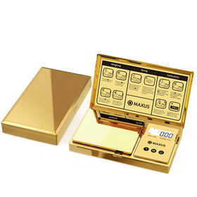 MAXUS digital gram scale with gold-plated cover for precise jewelry weighing.