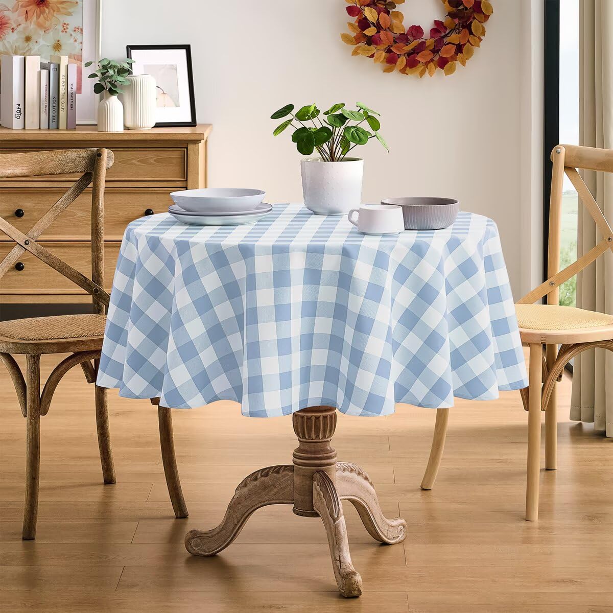 Maymiss waterproof gingham tablecloth protects surfaces from spills during meals.