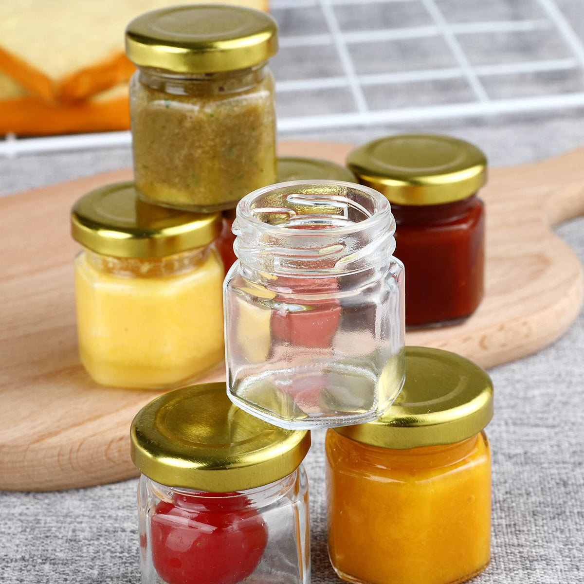 McUpper honey jar 1.5oz with gold lid for pouring.