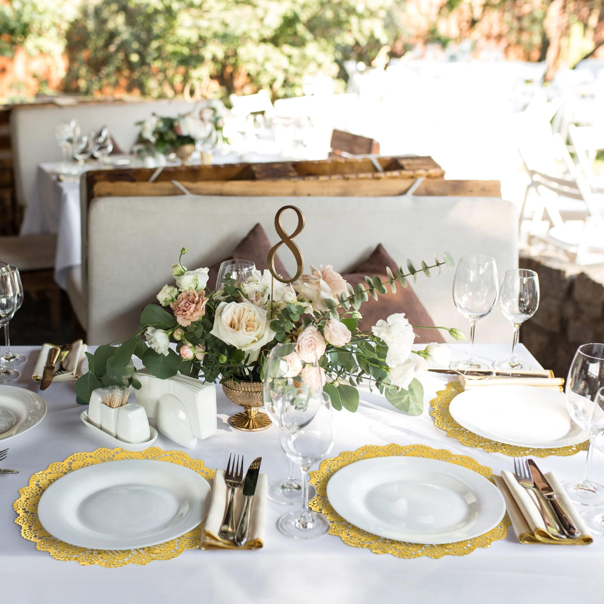 MCEAST crafts and gift wrap with gold-edge doilies for stylish presentation.