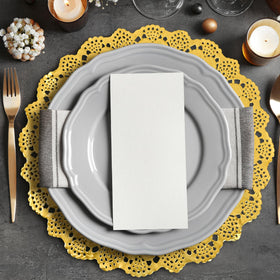 MCEAST dinner party setup using gold doilies for elegant tables.