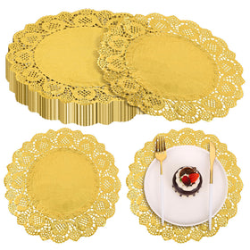 MCEAST round gold doilies with lace edge to elevate desserts and table aesthetics.