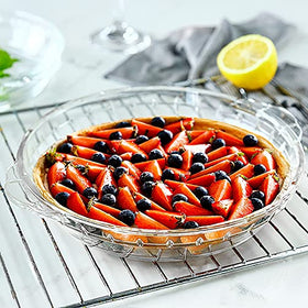 MCIRCO serving pie on table using clear glass dish