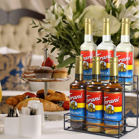 MCSAPIL syrup rack displayed on a kitchen shelf with durable black iron steel finish.