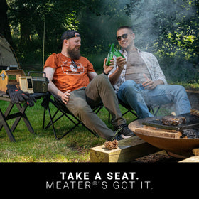 MEATER Block on a backyard grill during a family cookout