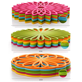 ME.FAN yellow flower trivet used under steaming pots.