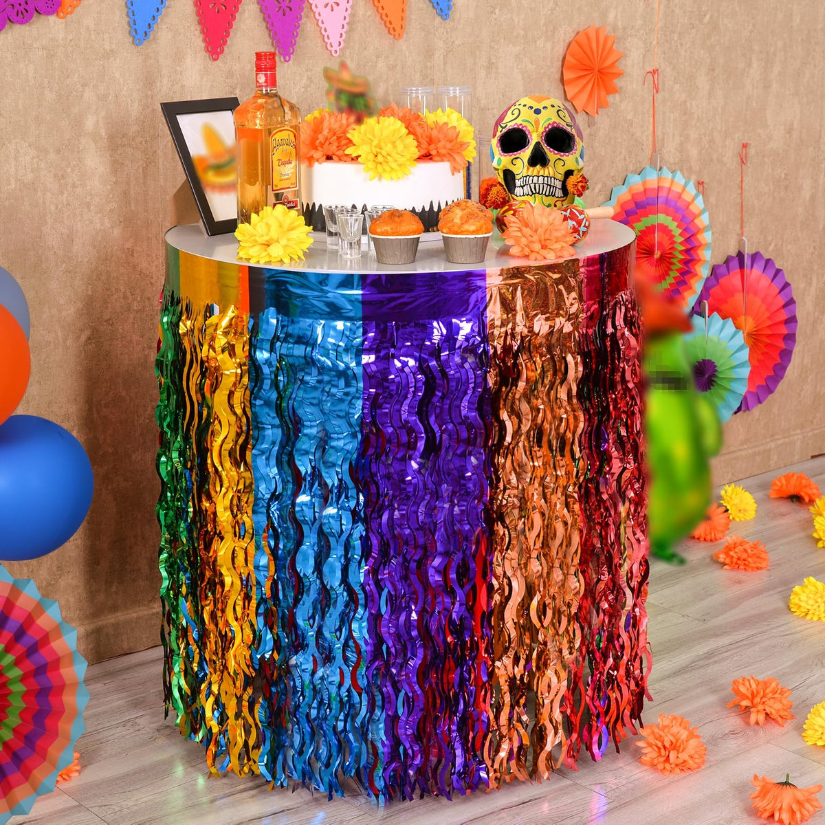 Mega-L Fiesta table skirt in orange brings warm glow to Dia de los Muertos or parties.