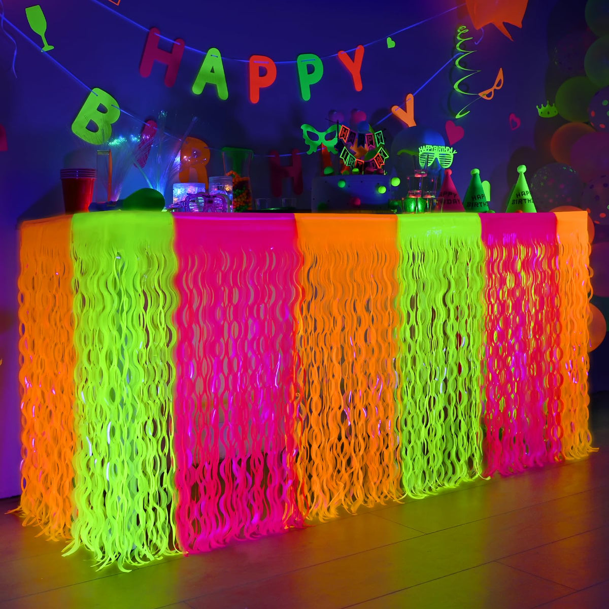 Mega-L Glow neon table skirt with fringe complements neon party table decor.