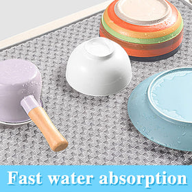 Meirrnyyu gray drying mat folded for compact storage.