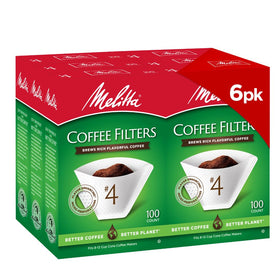 Melitta four-cone filters in a white pack for reliable 8-12 cup brews.