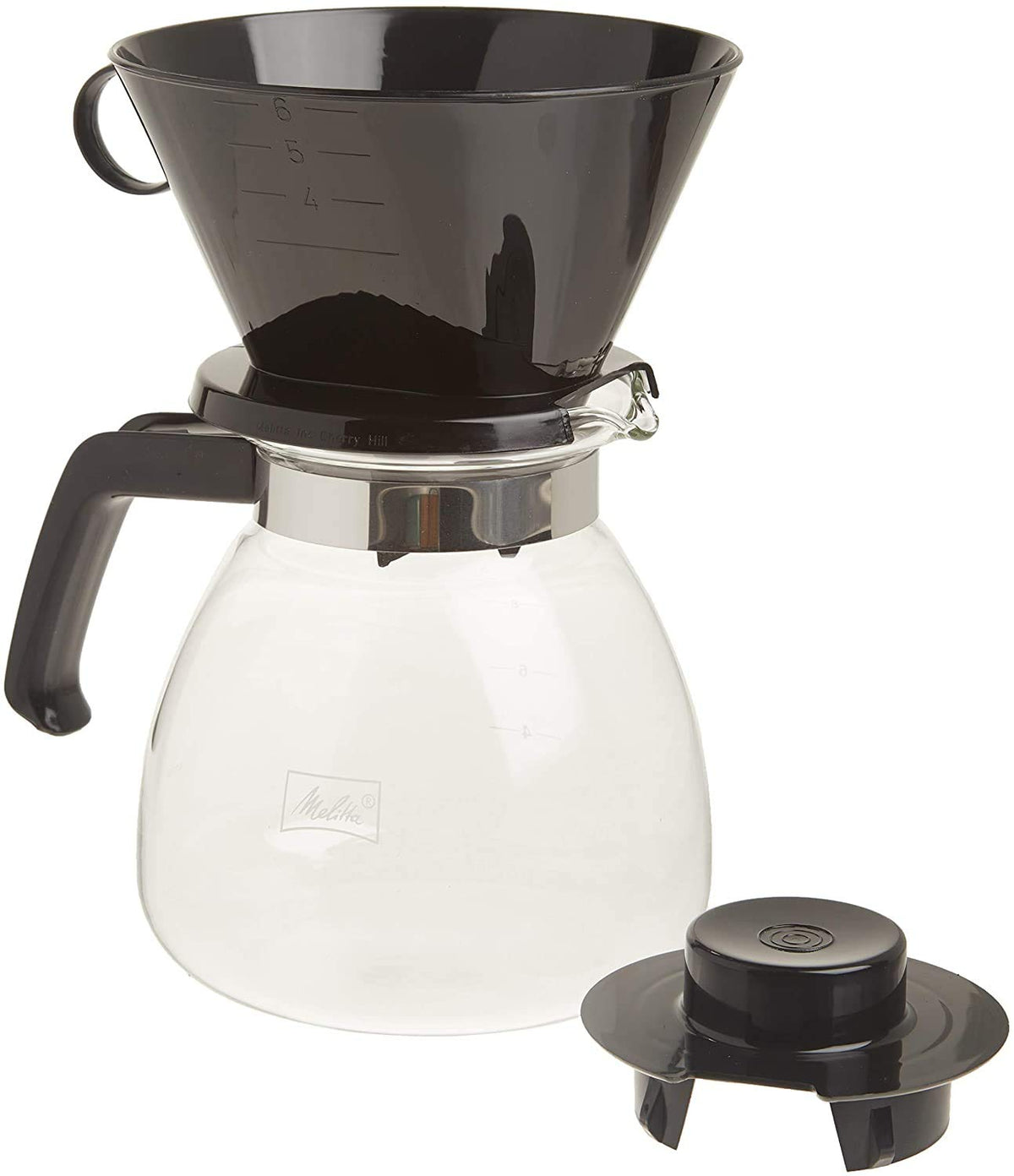 Melitta pour-over cone with lid in use for precise, enjoyable brewing.