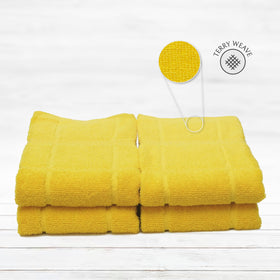 Mellow Buff towels drying dishes in a clean kitchen, showing absorbent performance