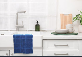 Mellow Buff navy blue towels brighten the kitchen with practical cleaning