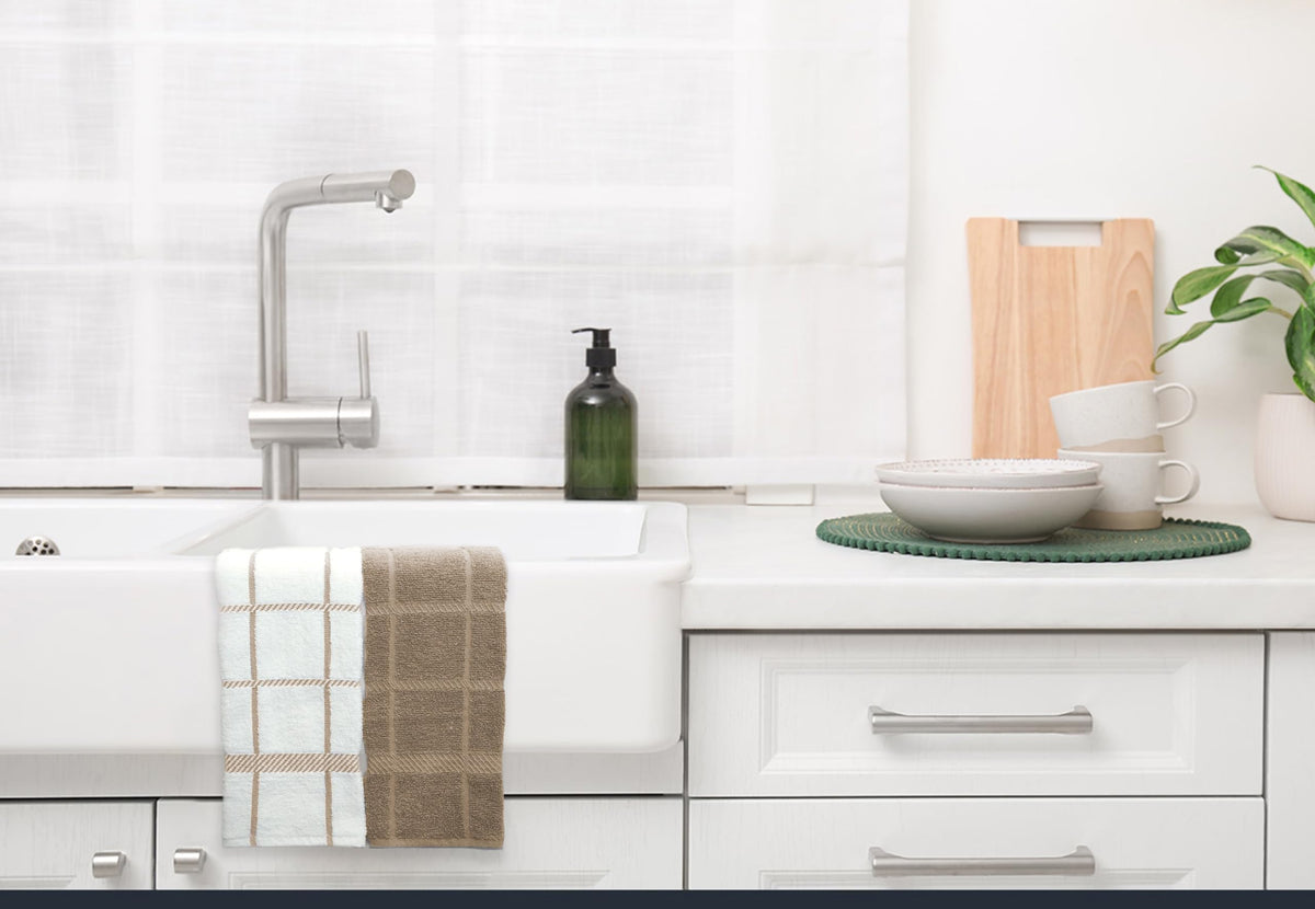 Mellow Buff tan towels offer soft texture and reliable absorbency for kitchen tasks.