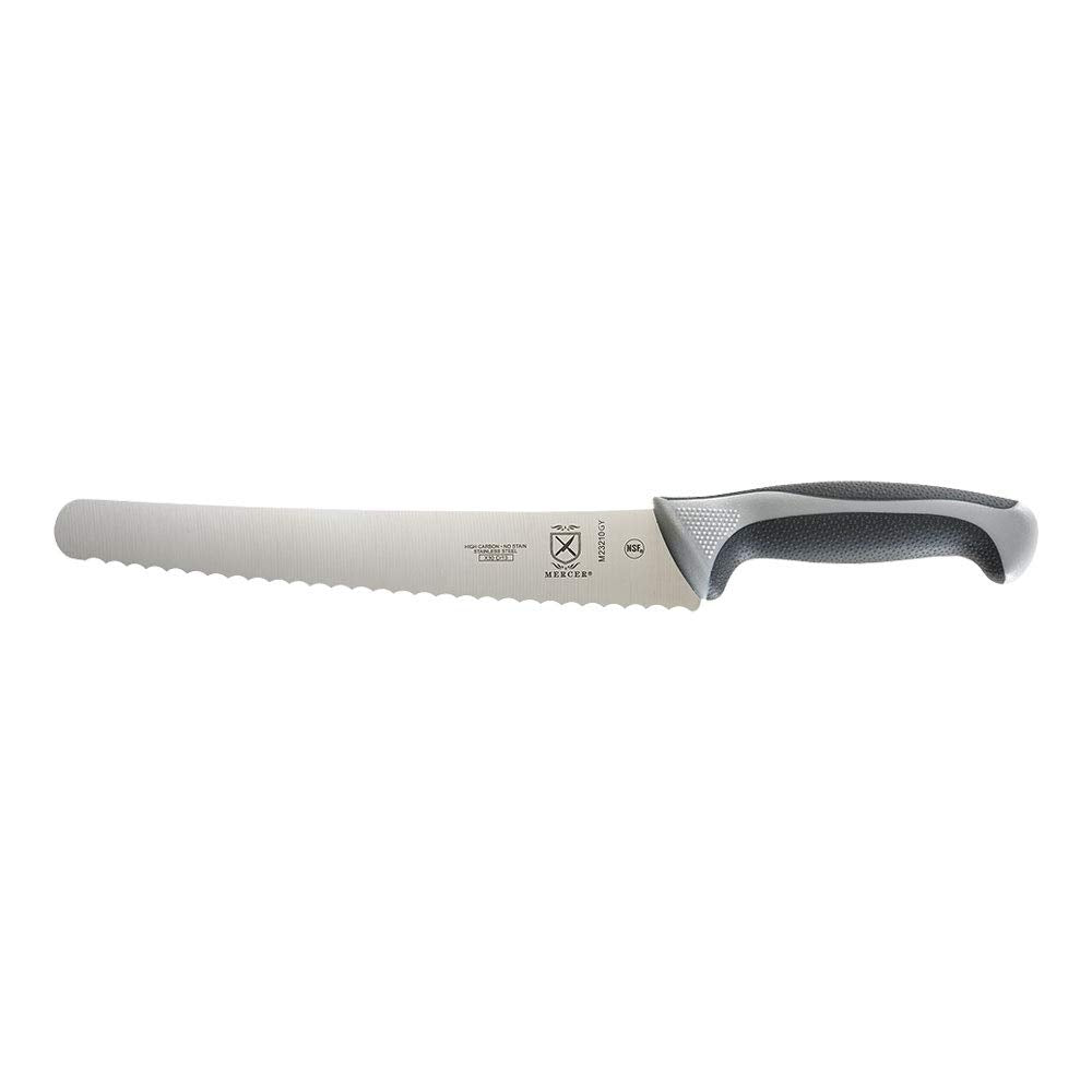 Mercer Culinary Millennia 10-inch bread knife with wavy edge in gray slicing through bread crusts clearly