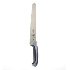 Mercer Culinary Millennia bread knife demonstrates crust-friendly slice on dense loaf