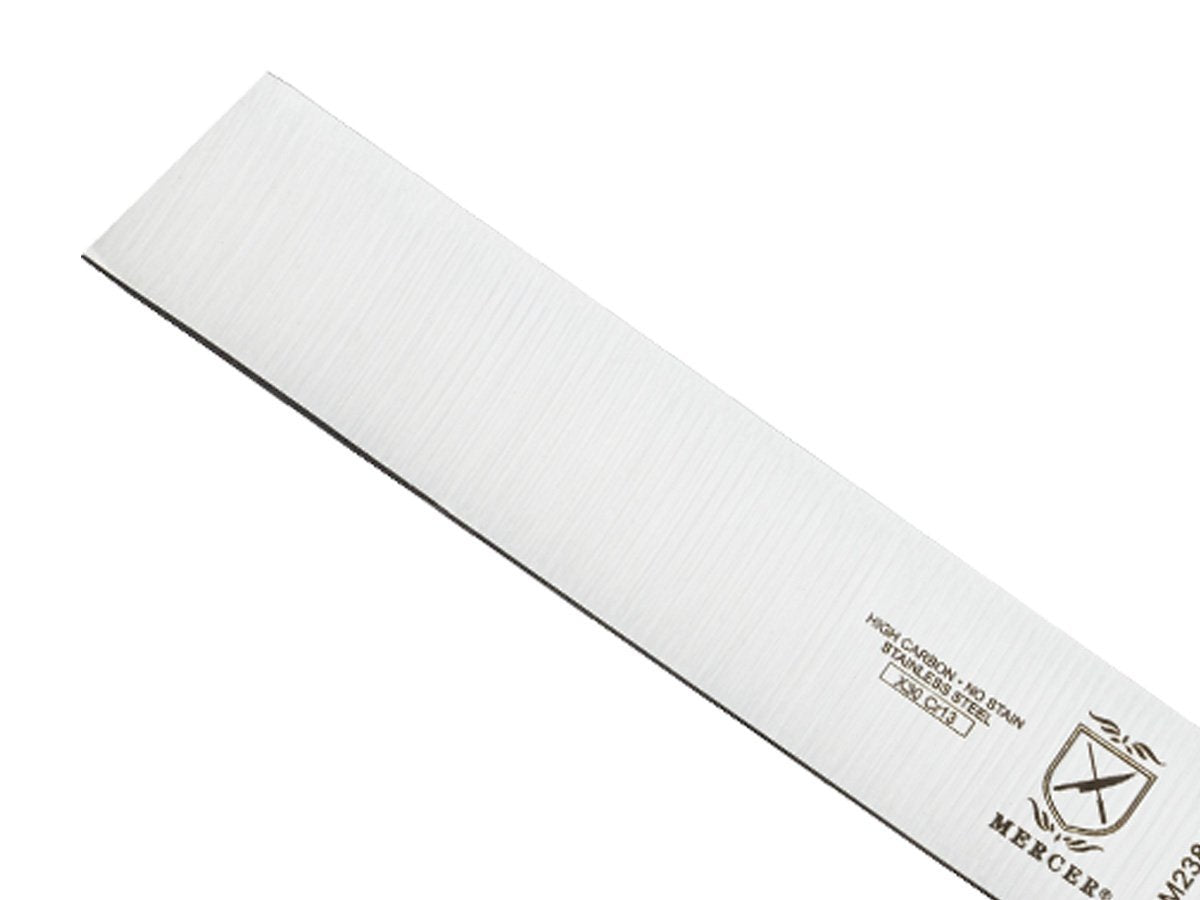 Mercer Culinary Millennia green handle detail highlighting ergonomic grip.