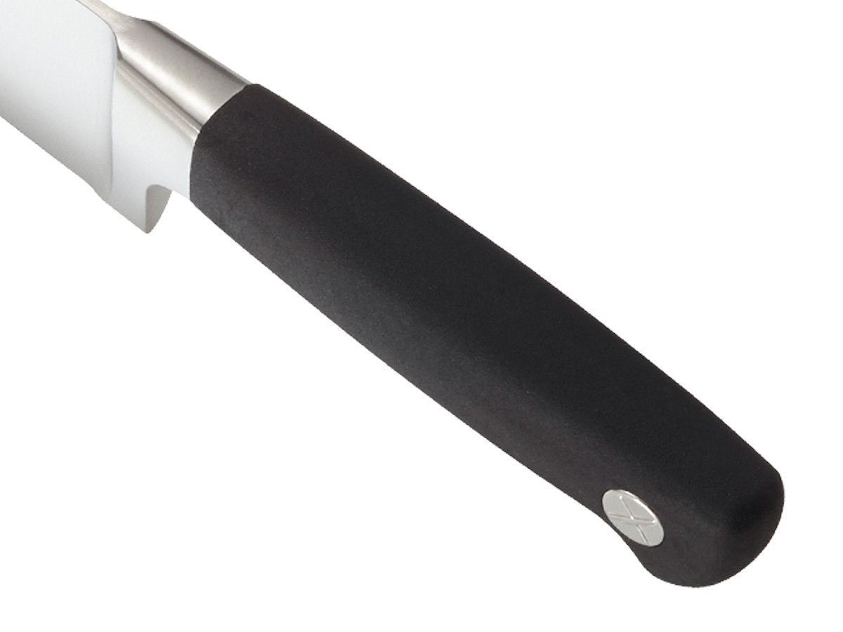 Mercer Genesis blade close-up reveals durable high-carbon steel and tapered edge.