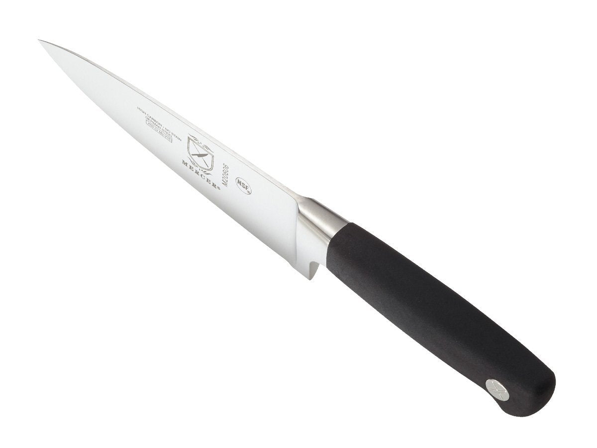 Mercer Genesis 6-Inch in use for chopping and slicing vegetables.