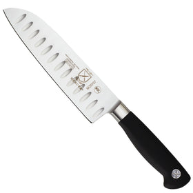 Mercer Genesis 7in Santoku blade close-up shows a sharp edge for precise slicing.