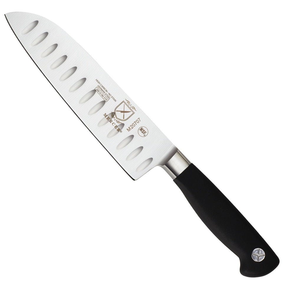 Mercer Genesis 7in Santoku blade close-up shows a sharp edge for precise slicing.