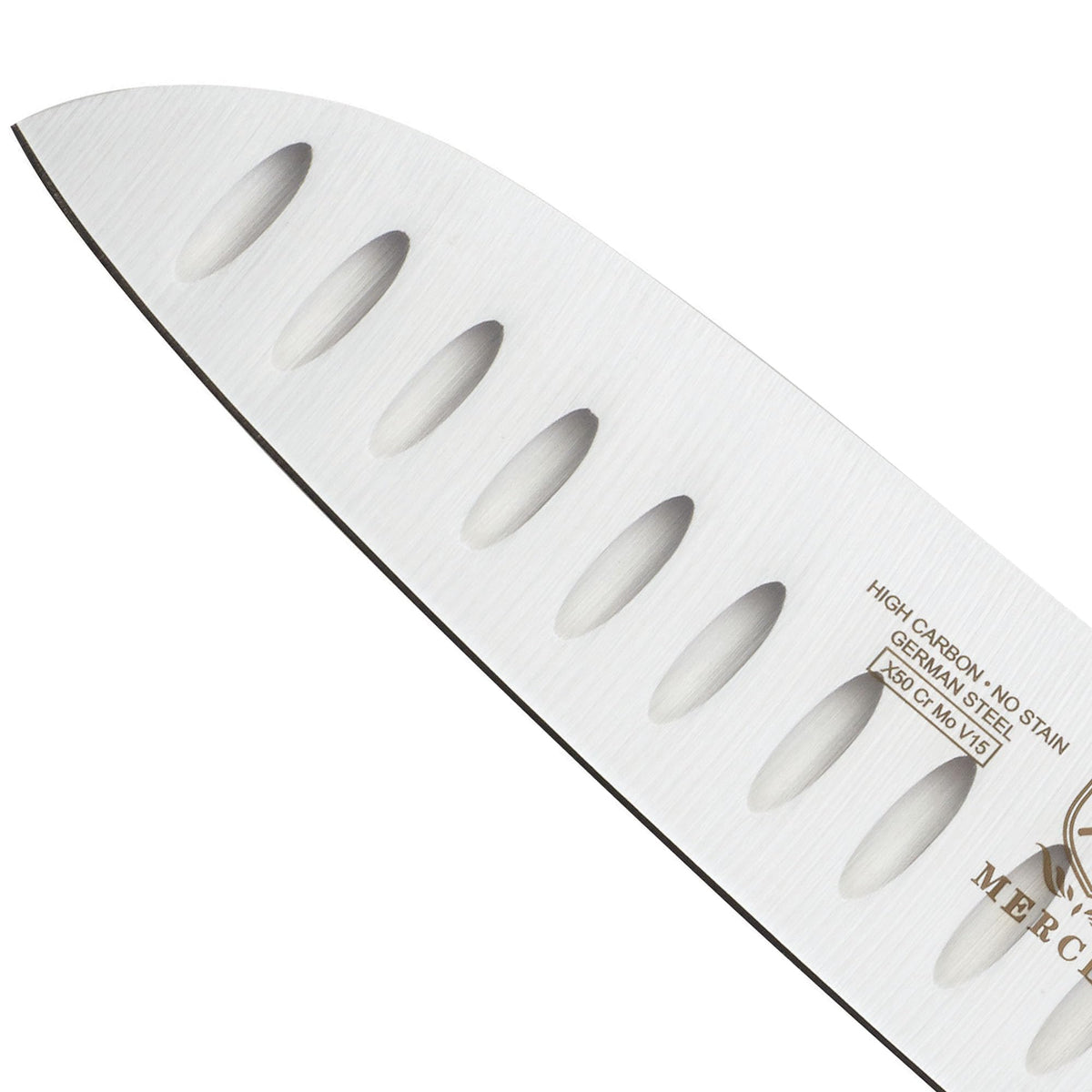 Mercer Genesis 7in Santoku balanced bolster supports controlled cutting.