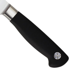 Mercer Genesis 7in Santoku Granton edge detail reduces sticking for thin slices.