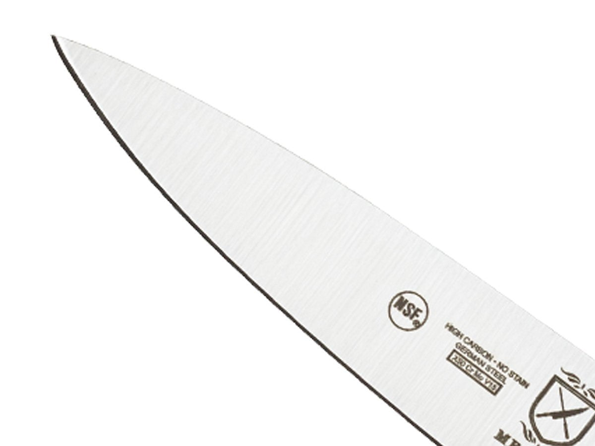 Mercer Renaissance paring knife slicing mango with precision
