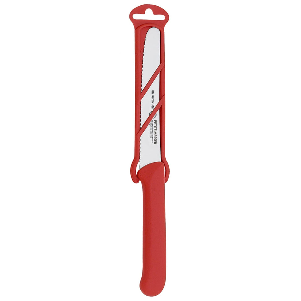 Messermeister four-and-a-half-inch tomato knife blade close-up for precise tomato slices.