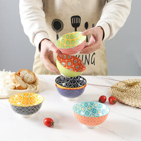 Metahom bowls with vibrant colors and geometric patterns for lively tables.