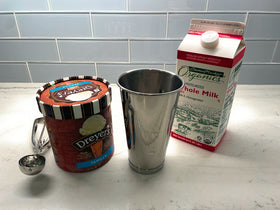 Metal Magery cups feature ergonomic grip for secure pouring and comfortable handling.