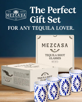 MEZCASA Talavera shot glass in blue craft, suited for home bar display and serving.