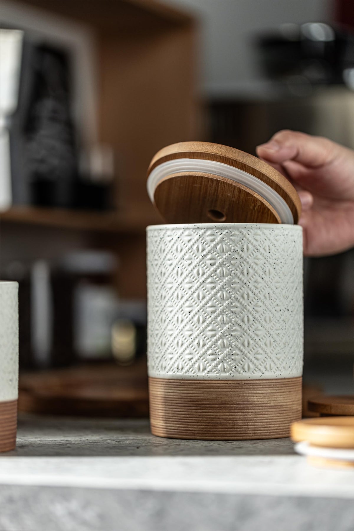 Miamolo embossed ceramic jar in white highlighting farmhouse style