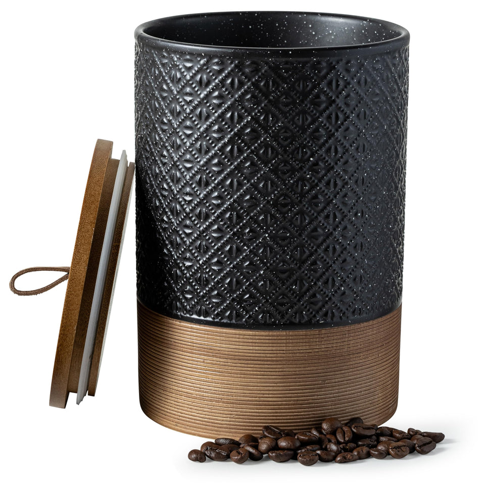 Miamolo large jar with embossed lid on countertop shows vintage pattern and freshness.