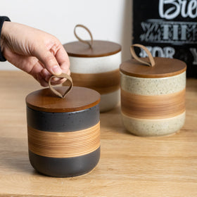 Miamolo rope-lid ceramic jar highlights decorative kitchen storage.