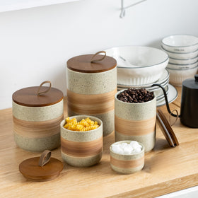 Wooden lid seals tightly to keep moisture and odors away in Miamolo jars.