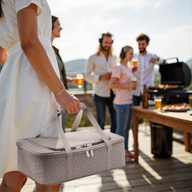 Exterior pocket on MIAOJIE carrier stores utensils for easy access