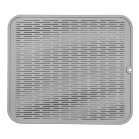 MicoYang silicone drying mat on counter dries dishes and protects surfaces.