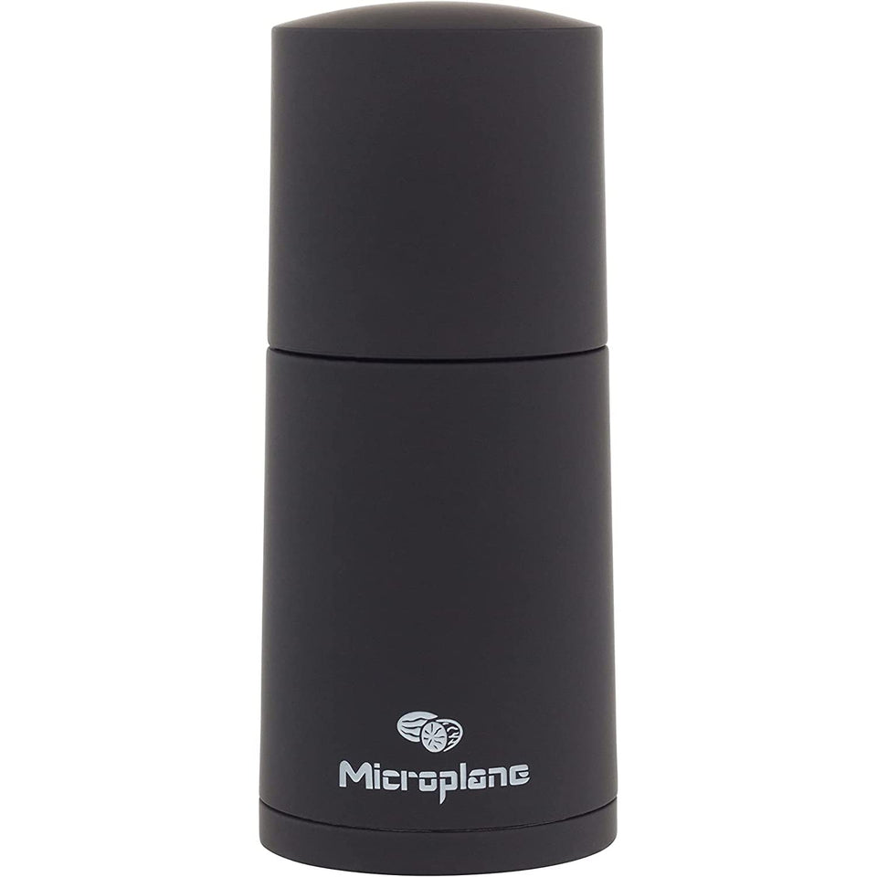 Microplane cinnamon mill top view with airtight spice saver for fresh grind.