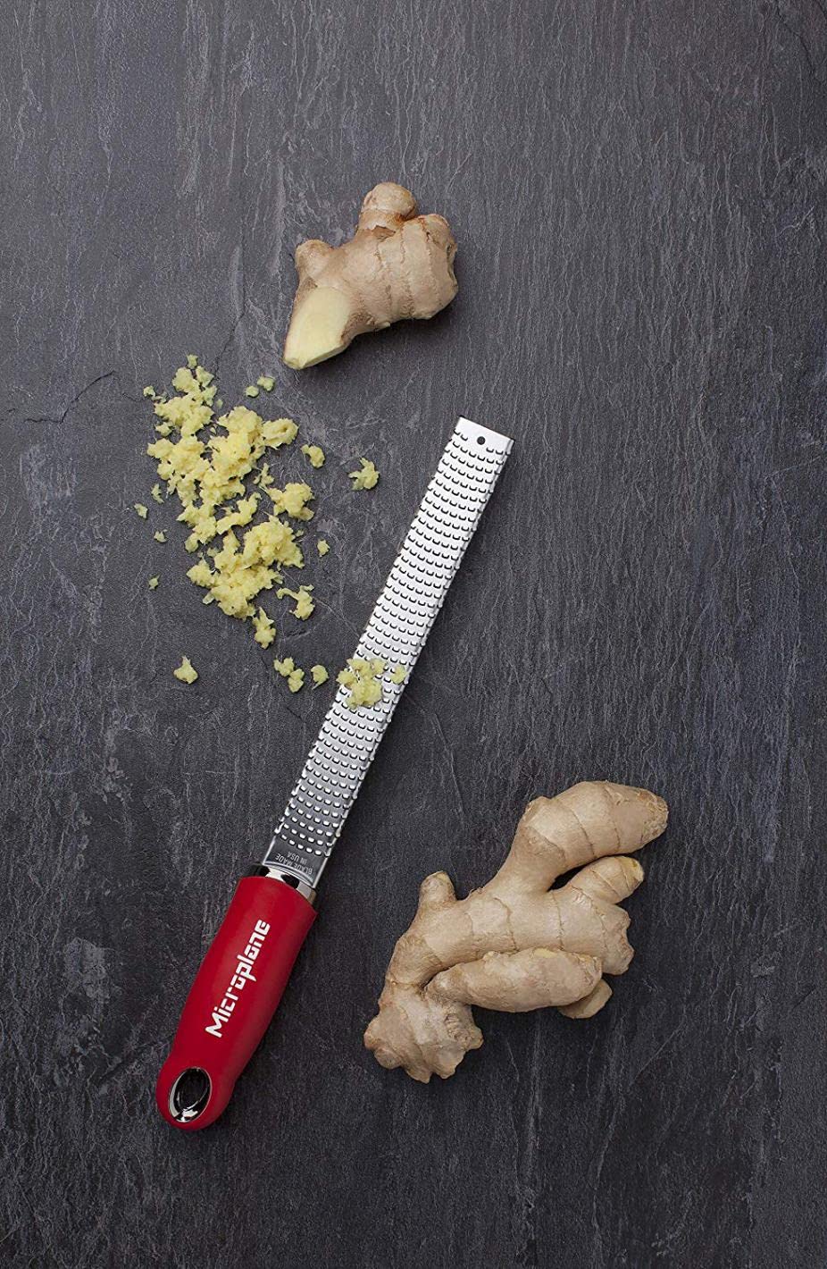 Microplane Classic Red Zester Grater close-up blade for ultra-sharp grating.