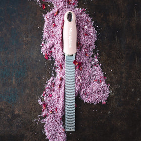 Microplane dusty rose zester dishwasher safe for easy cleanup.