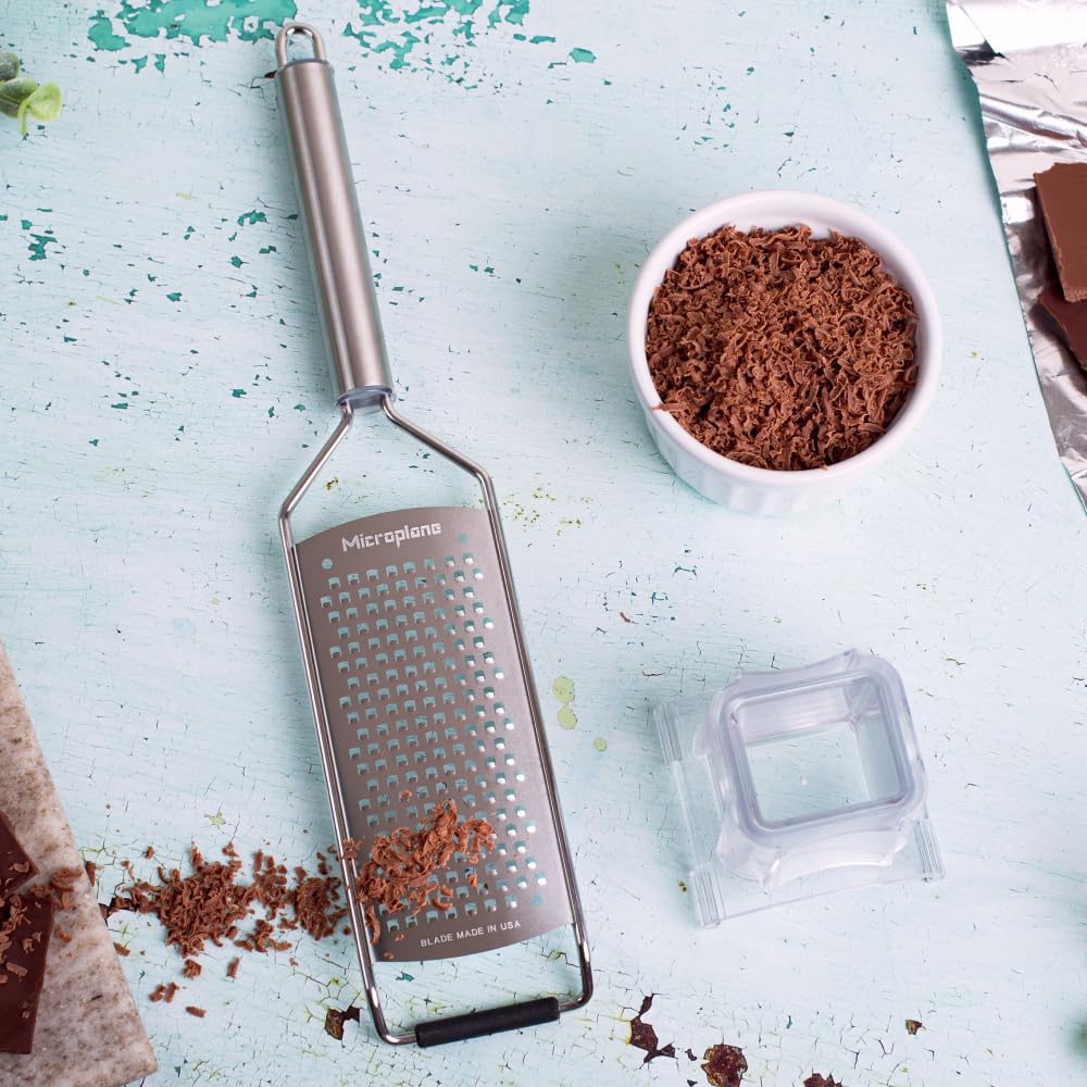 Microplane ideal for grating ginger, coconut, nuts, and horseradish.
