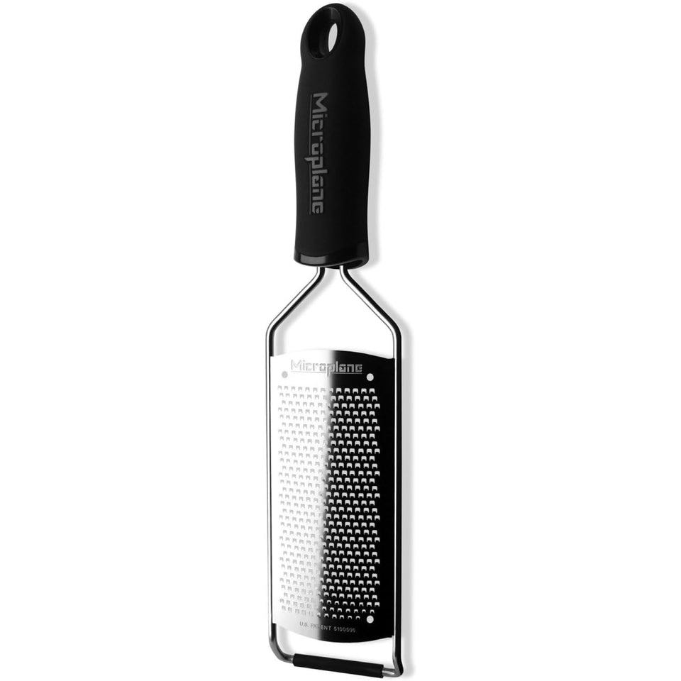 Microplane Gourmet Series hard cheese grater in black, front view for powder-like shredding.
